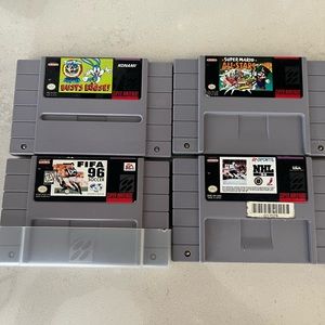 6 super nintendo games and 2 remote controllers. Last time I checked it worked